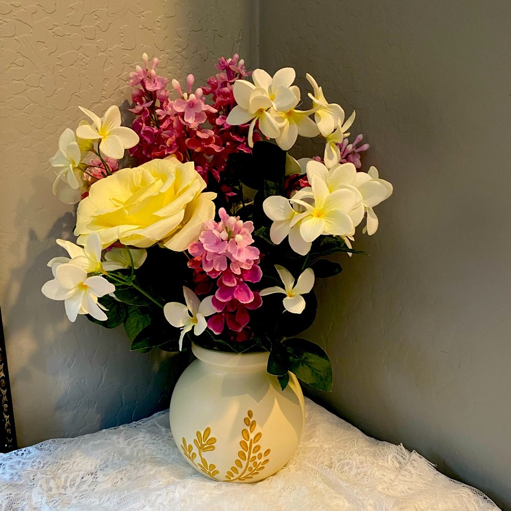 Beautiful silk flowers arrangement in a decorated ceramic vase.  $35.